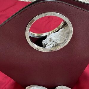 NWOT CALVIN KLEIN with a removable strap 😊😊